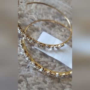 Hoop women's earrings with crystals